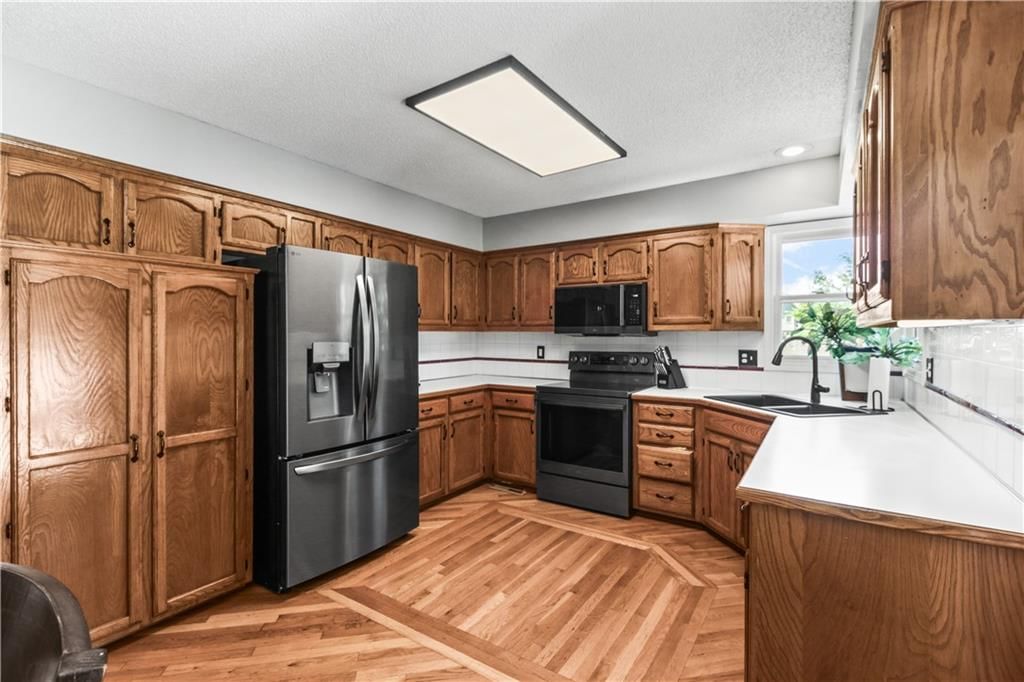 4001 NW Hidden Pointe Drive — photo 7