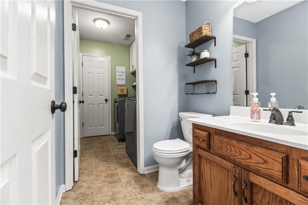 4001 NW Hidden Pointe Drive — photo 14