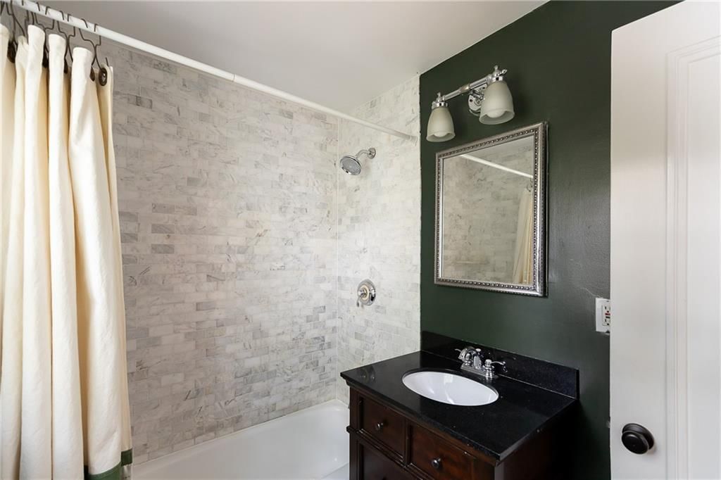 316 E 68th Terrace — photo 17