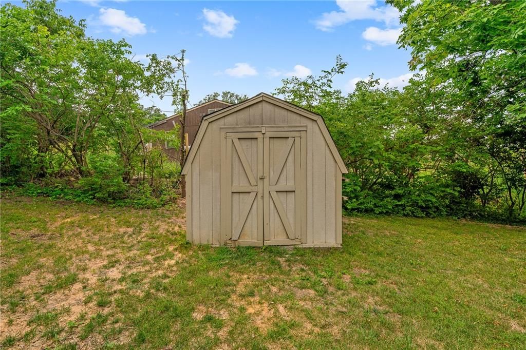 10305 NW Meadow Lane Circle — photo 44