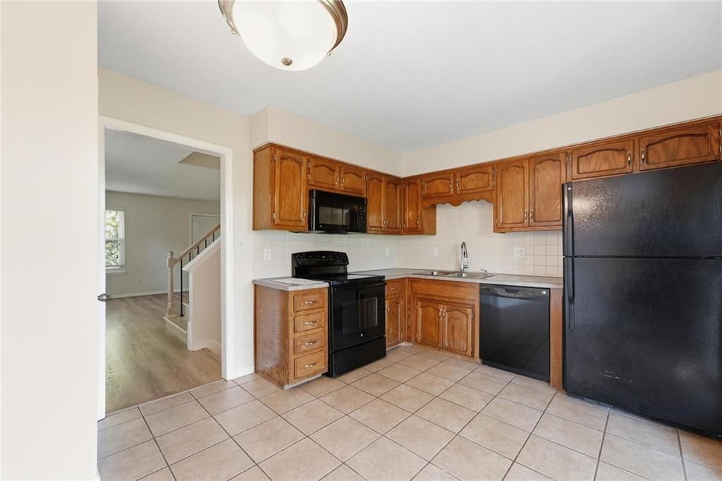 Photo 8 of 21 - 8709 N Hull Avenue, Kansas City, MO 64154