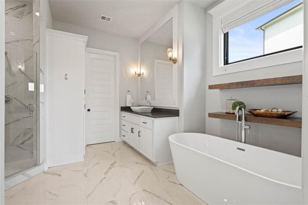 105 NW Ambersham Drive — photo 18