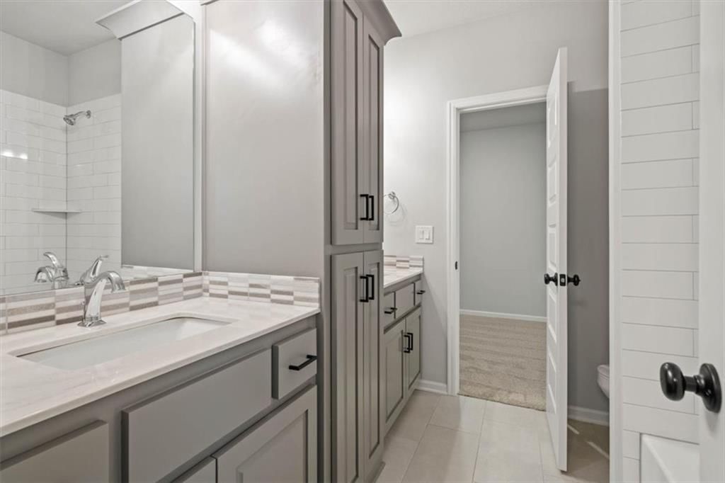 105 NW Ambersham Drive — photo 27