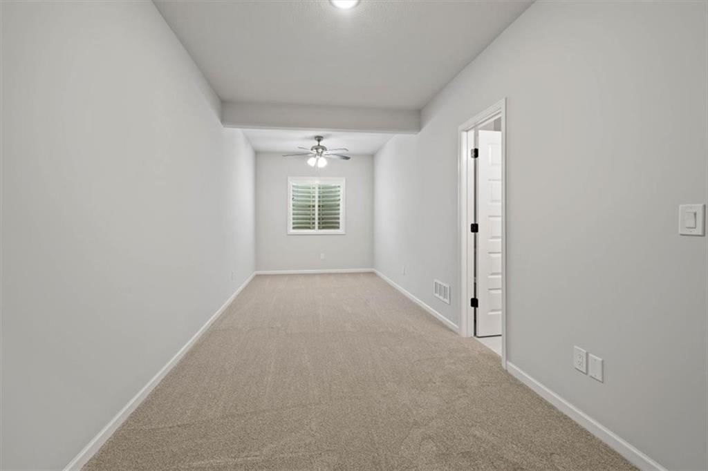 105 NW Ambersham Drive — photo 28