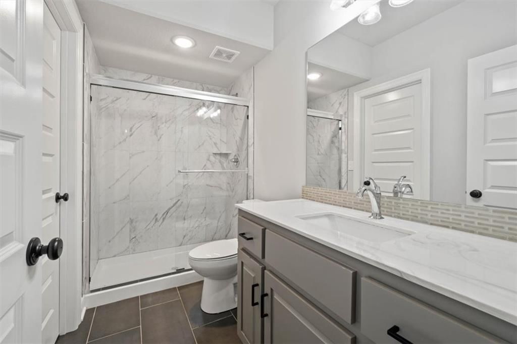 105 NW Ambersham Drive — photo 29