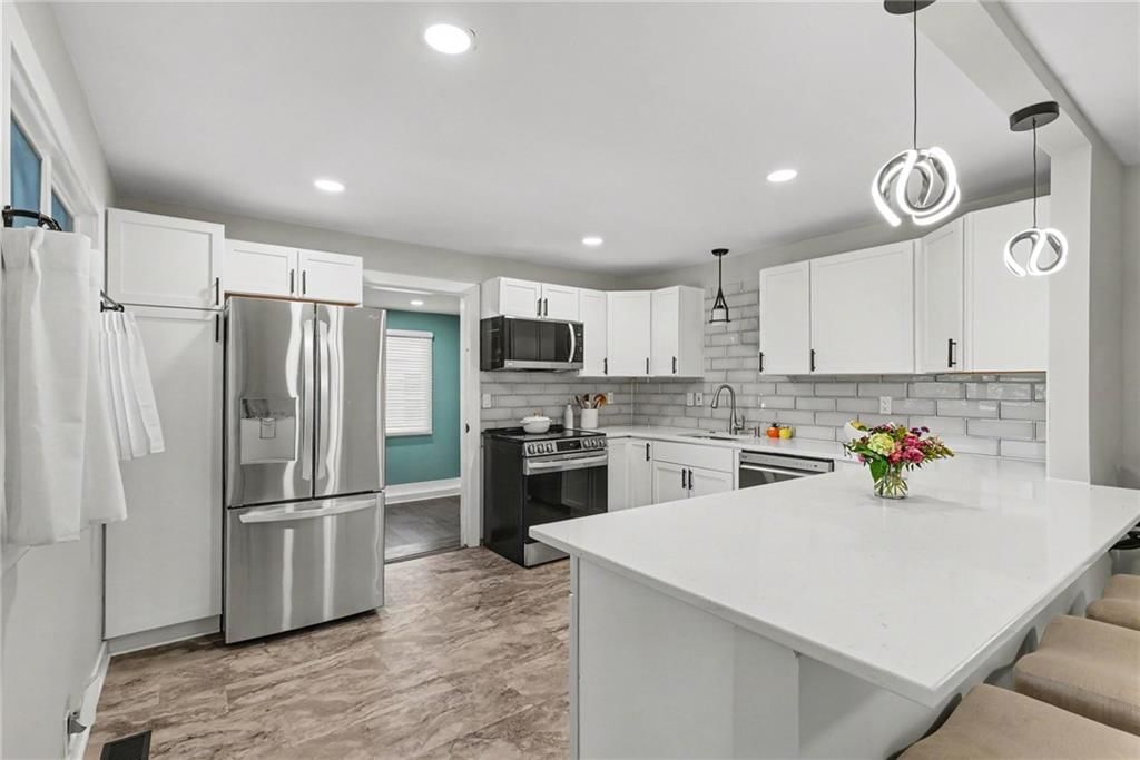 8400 Riggs Street — photo 15