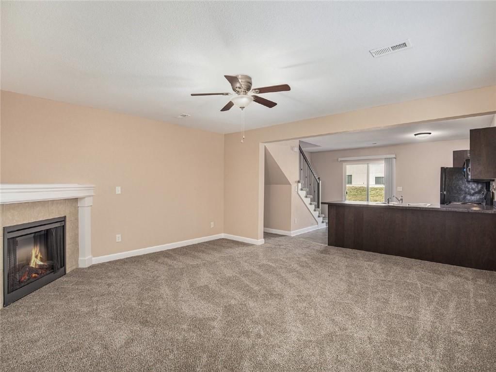 Photo 5 of 21 - 254 Pointe Lane, Raymore, MO 64083