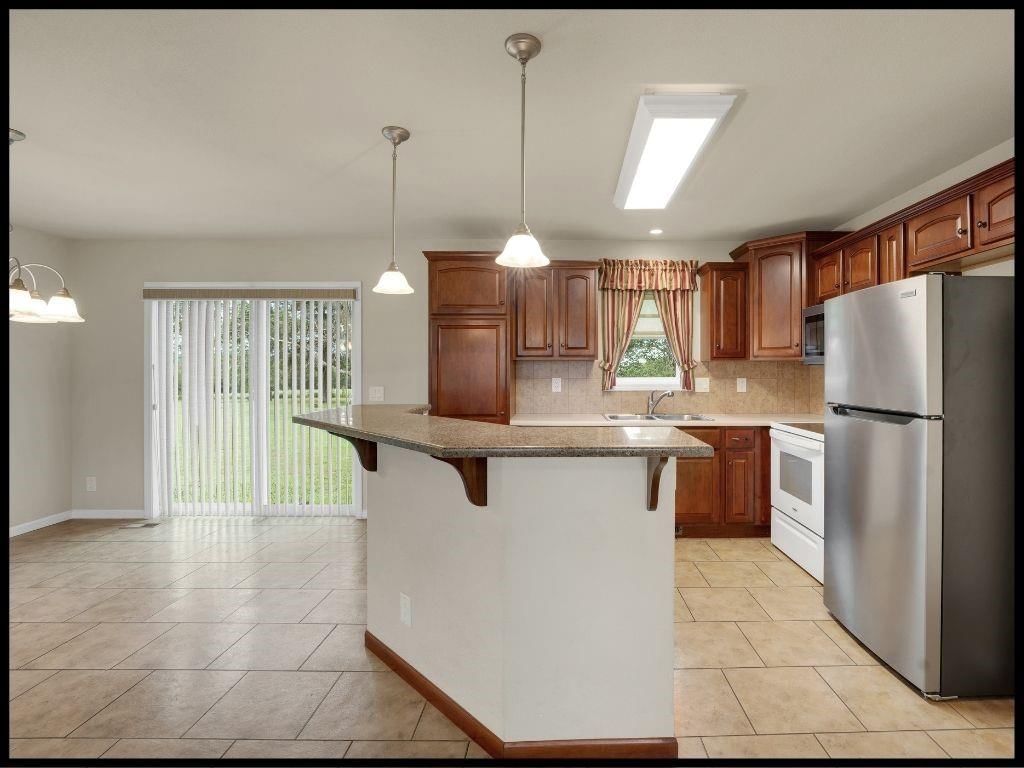 560 NE 115th Road — photo 16