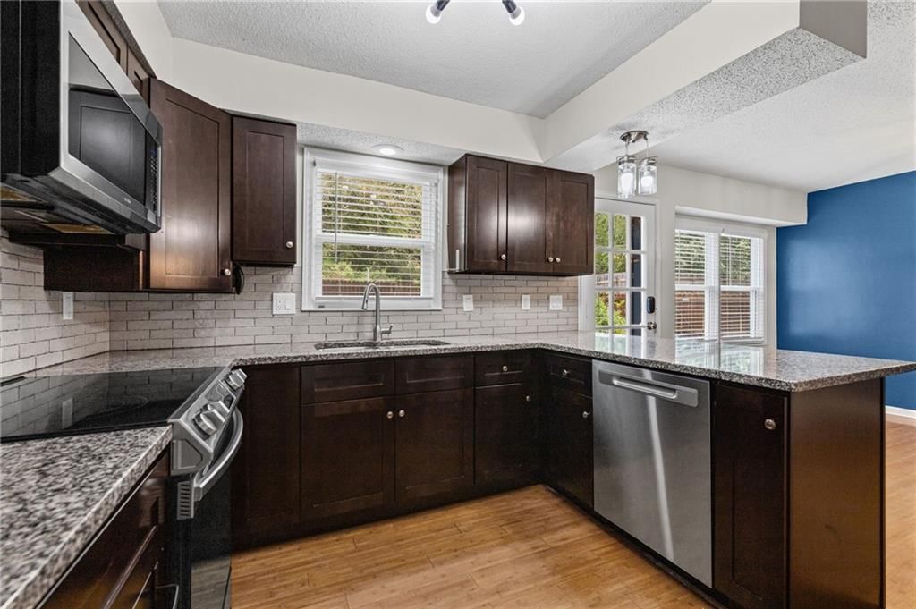 8933 Woodstone Street — photo 10