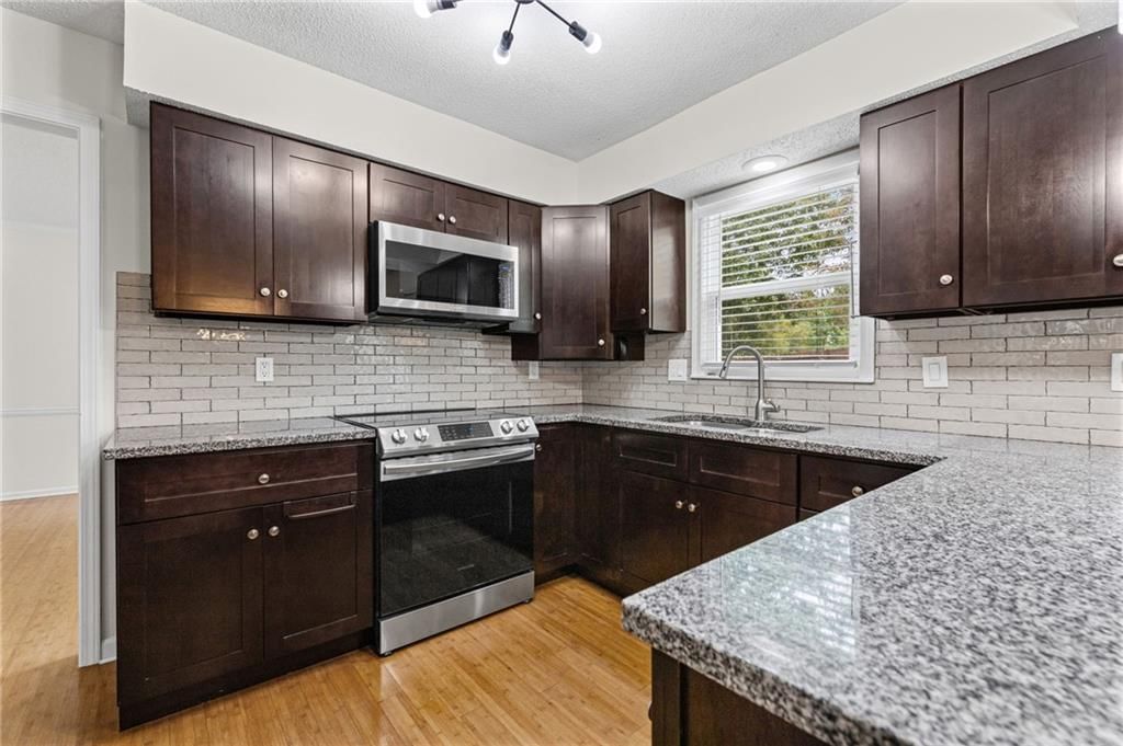 8933 Woodstone Street — photo 11