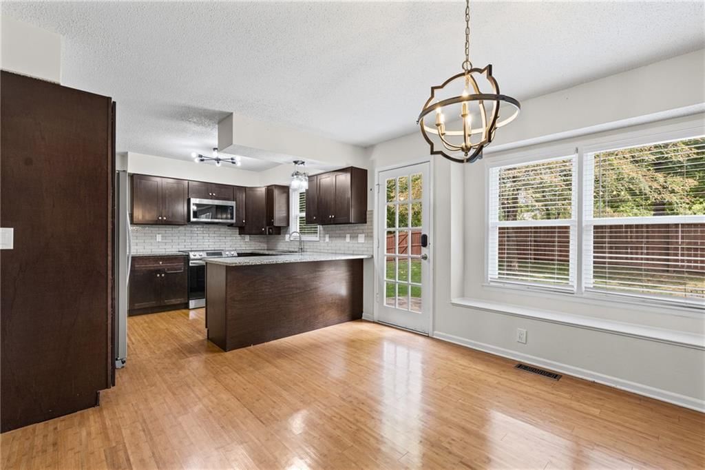8933 Woodstone Street — photo 15