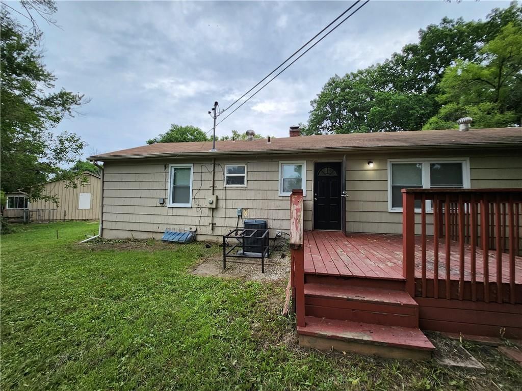 Covered patio, deck and big backyard at 6601 E 96TH Street, Kansas City, MO 64134