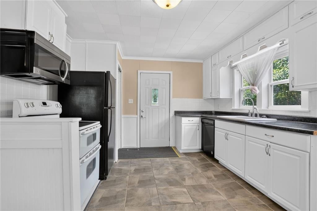 7614 Woodson Road — photo 5