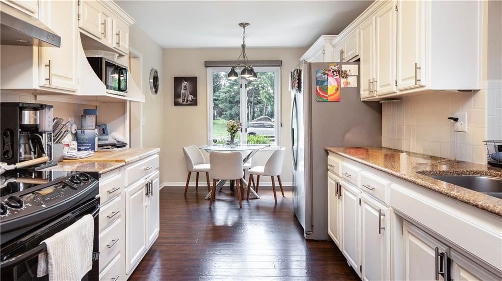 627 NW Timberbrooke Drive — photo 3