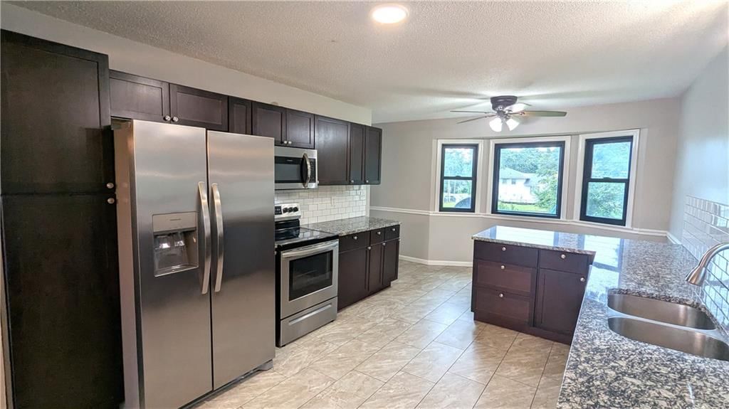 9909 E 76th Terrace — photo 15