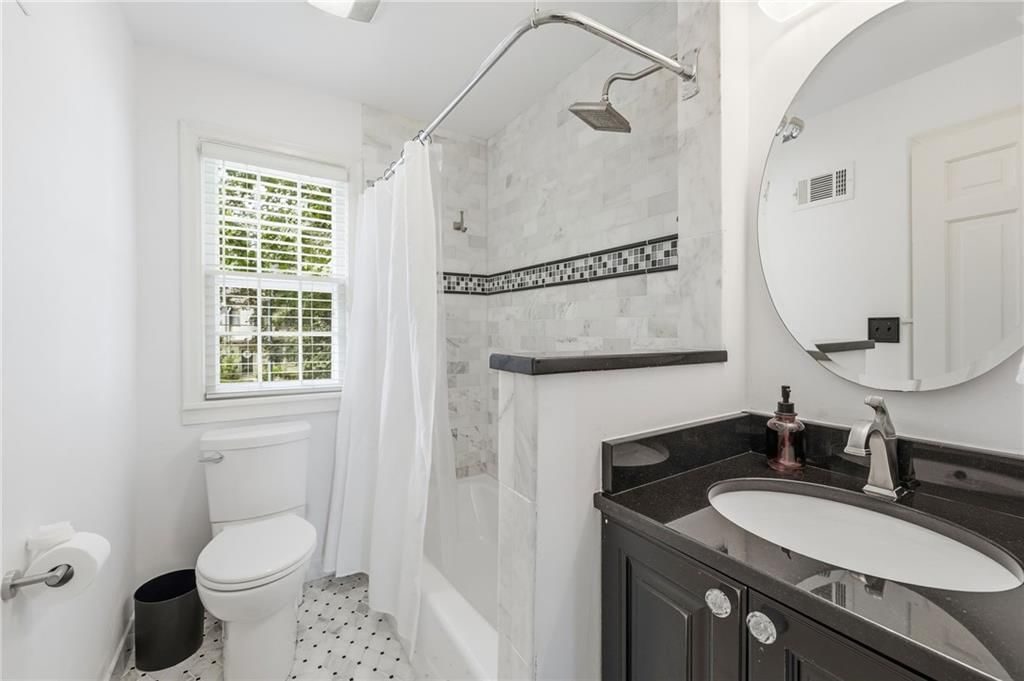 619 W 69th Terrace — photo 30