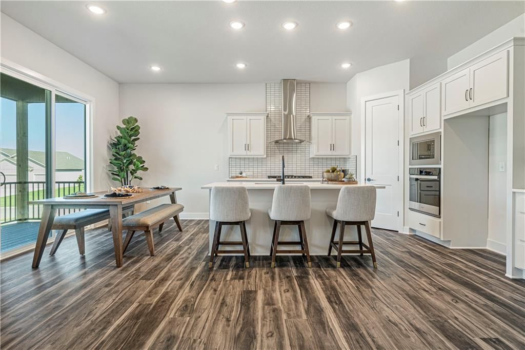 Photo 10 of 29 - 1817 Woodward Circle, Raymore, MO 64083