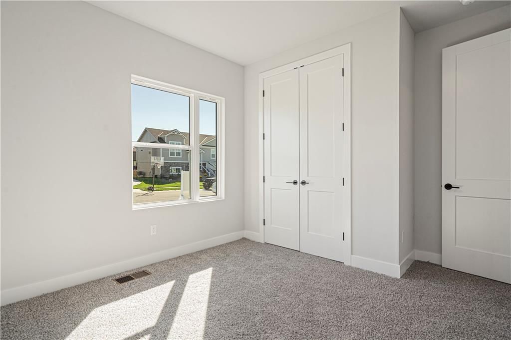 Photo 24 of 29 - 1817 Woodward Circle, Raymore, MO 64083