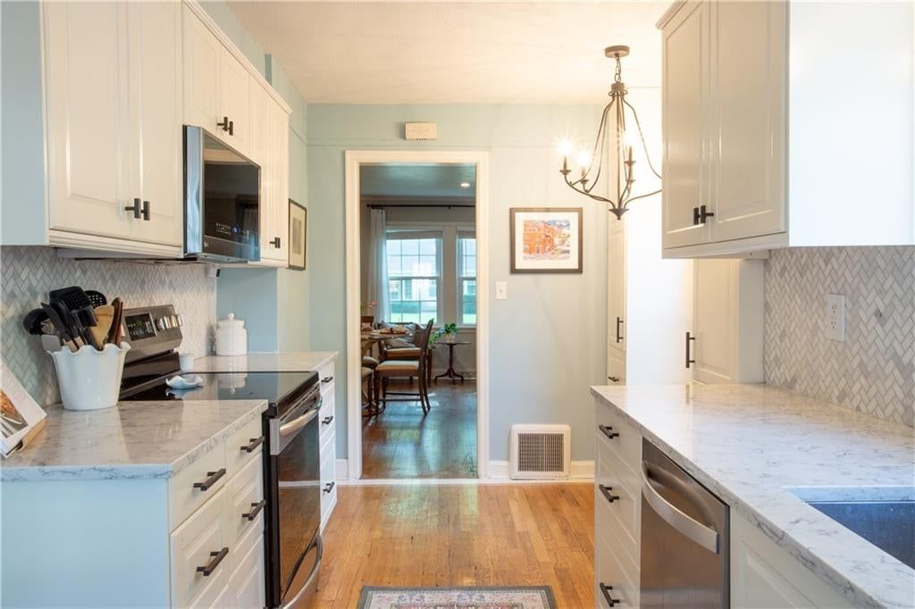 6015 DELMAR Street — photo 11