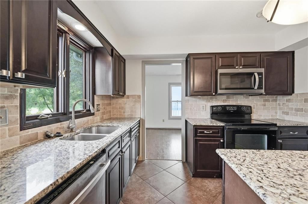 701 NE Burning Tree Street — photo 19