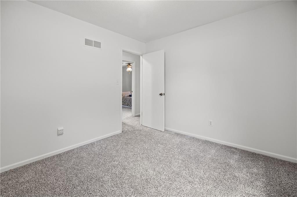 Finished basement at 503 S Park Drive, Raymore, MO 64083