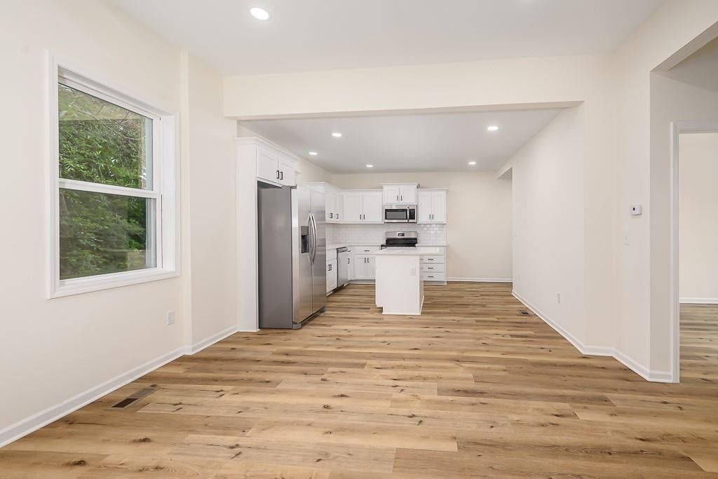 Hardwood floors and white trim at 1122 Randolph Street, Leavenworth, KS 66048