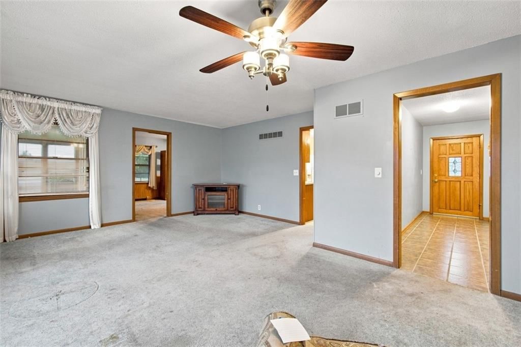 Tile floors at 207 Augustus Drive, Excelsior Springs, MO 64024
