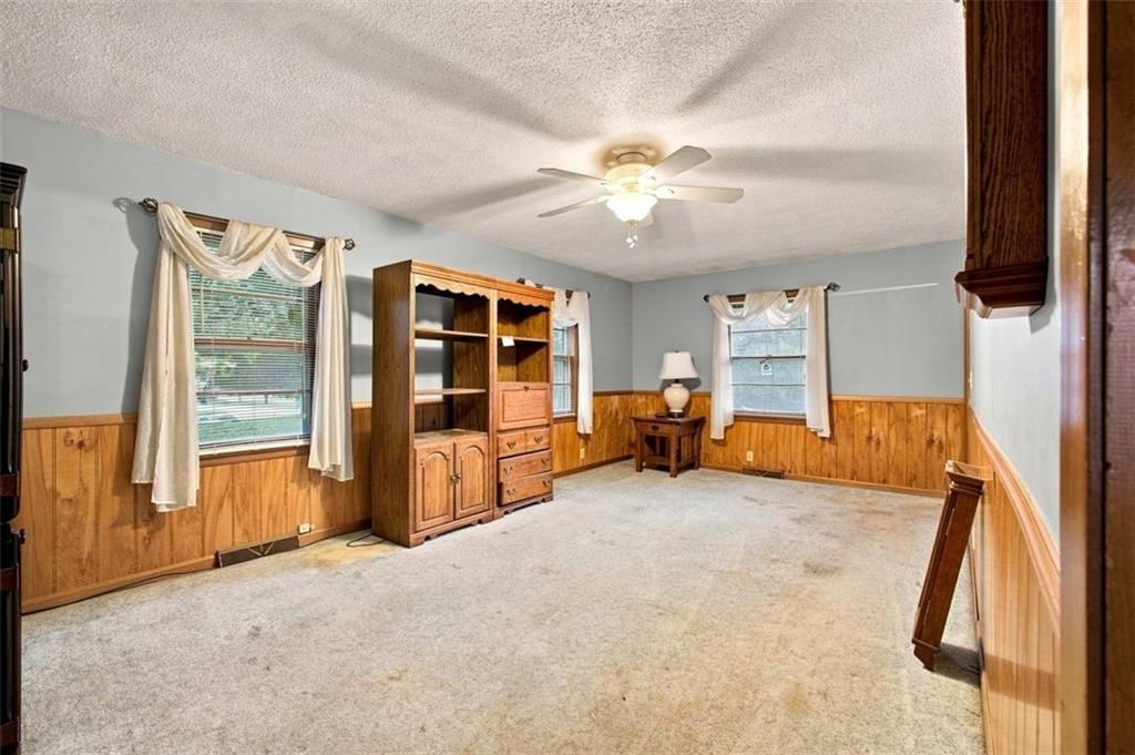 Wainscoting or board and batten, shiplap / paneling and accent wall at 207 Augustus Drive, Excelsior Springs, MO 64024