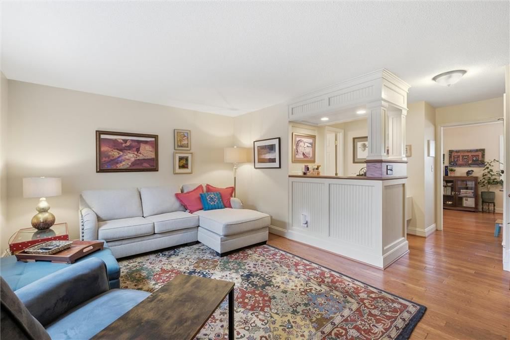 Open floor plan, hardwood floors and white trim at 9573 Outlook Drive, Overland Park, KS 66207
