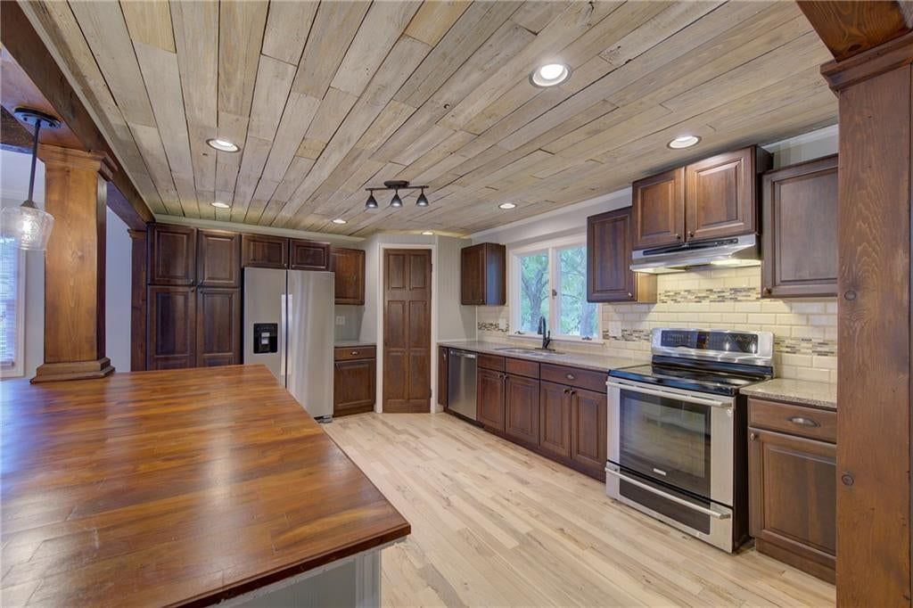 9927 N Harrison Drive — photo 5