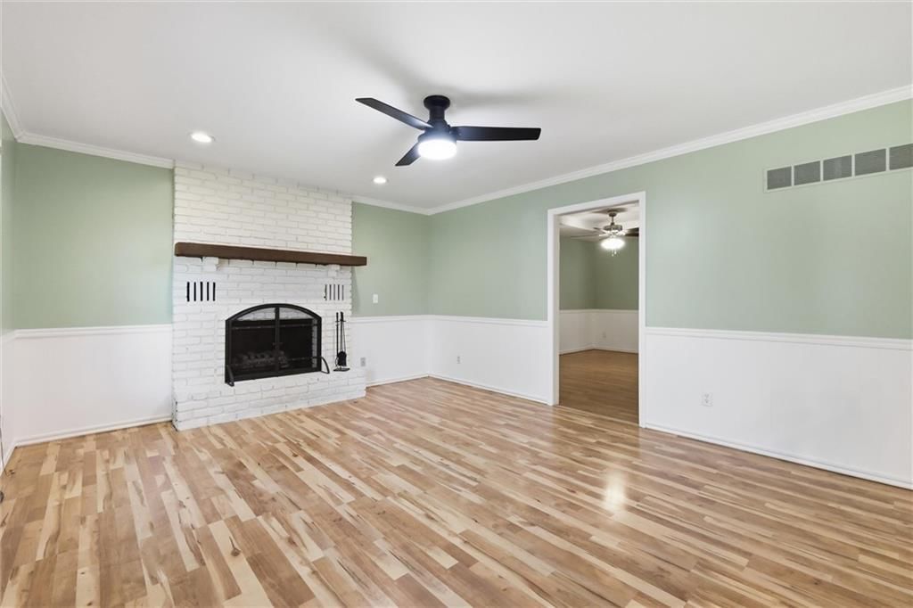 Tall ceilings, fireplace and open floor plan at 5519 NW Verlin Drive, Kansas City, MO 64152