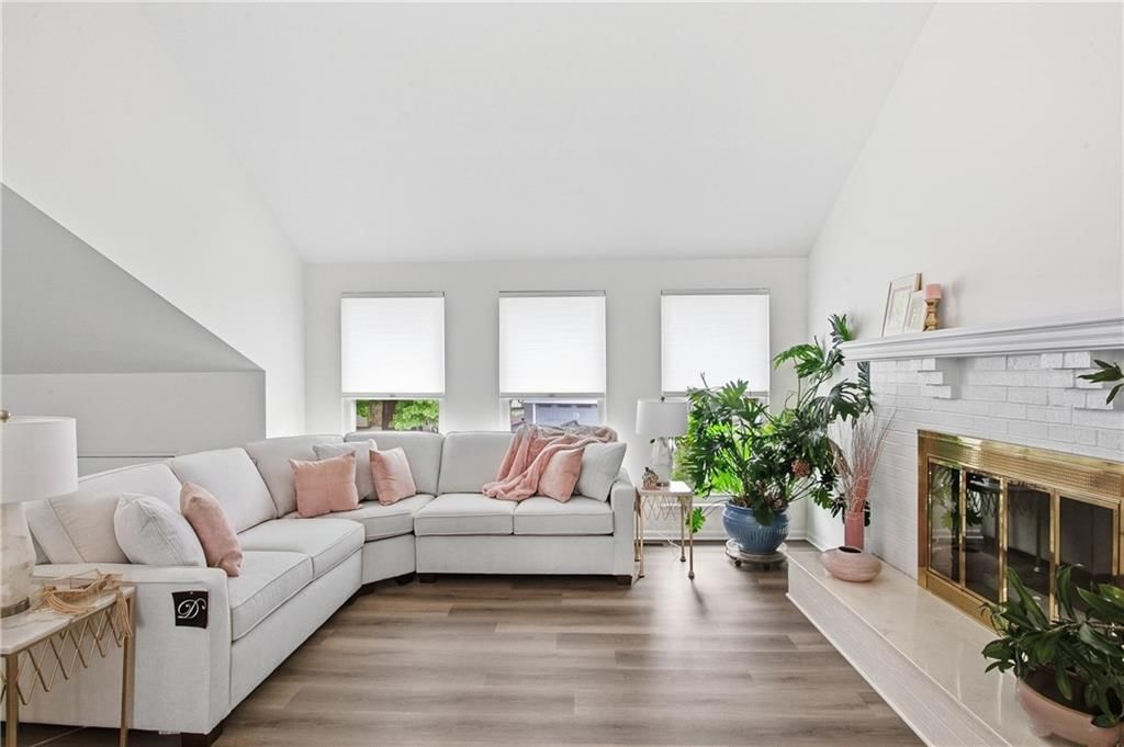 Open floor plan, tall ceilings and hardwood floors at 7426 Santa Fe Drive, Overland Park, KS 66204