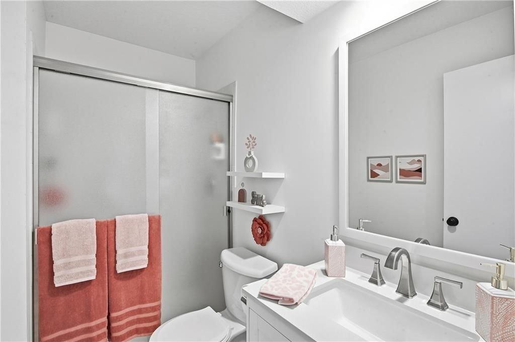 Frameless glass shower and tiled shower at 7426 Santa Fe Drive, Overland Park, KS 66204