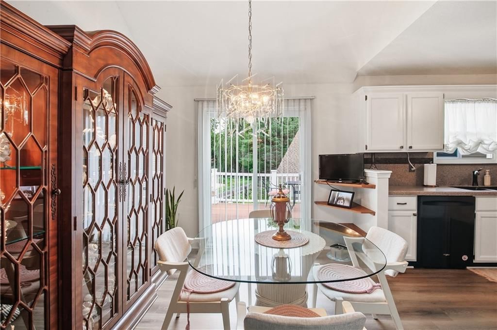 White kitchen, updated kitchen and granite counters at 7426 Santa Fe Drive, Overland Park, KS 66204