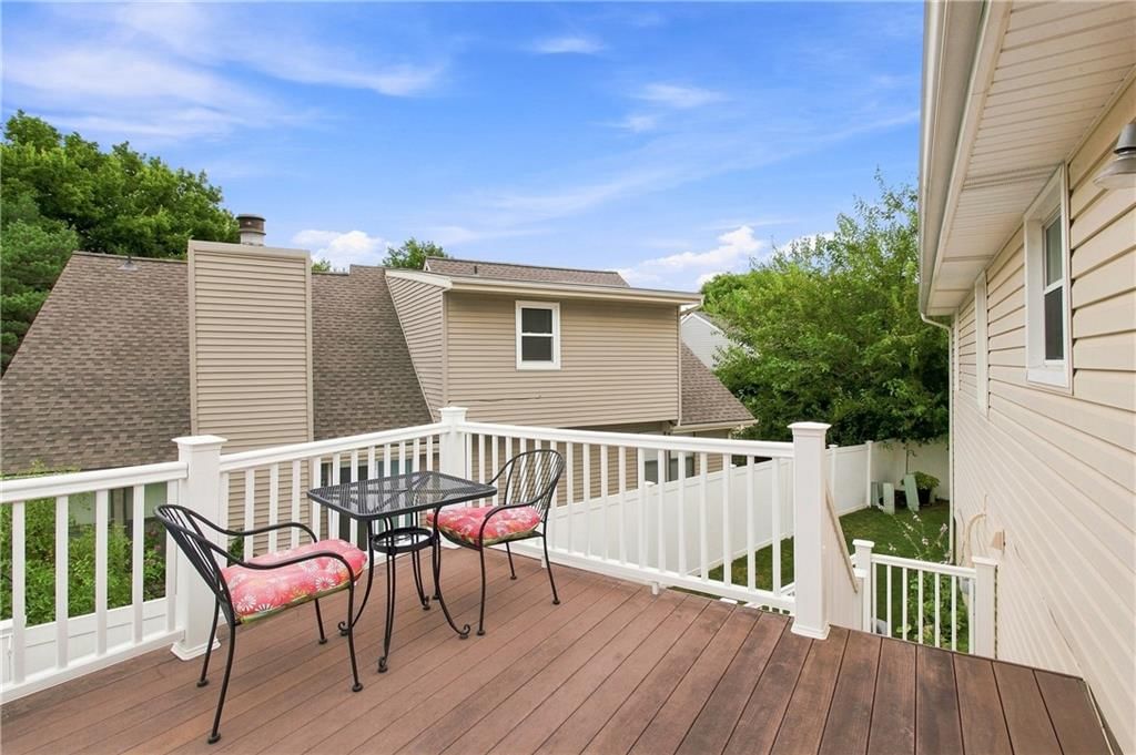 Covered patio, pergola and concrete patio at 7426 Santa Fe Drive, Overland Park, KS 66204