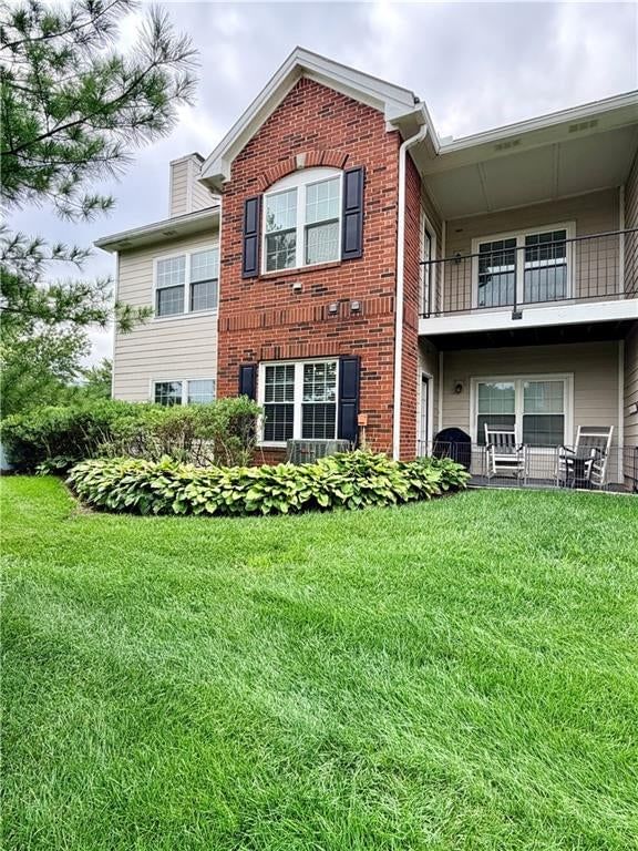 11607 Tomahawk Creek Parkway — photo 2