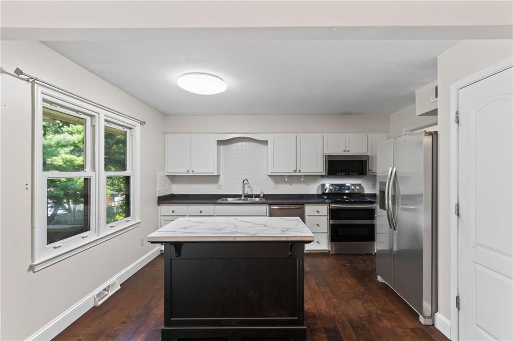 5524 NW Raintree Drive — photo 14