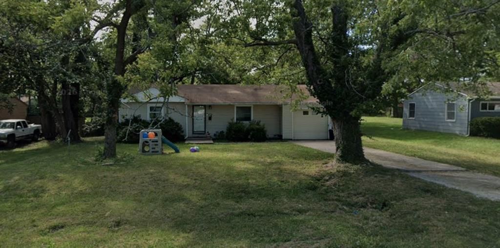 8308 James A Reed Road — photo 1