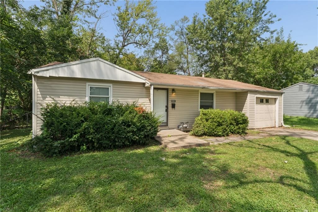 8308 James A Reed Road — photo 2