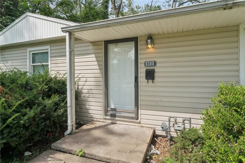 8308 James A Reed Road — photo 4