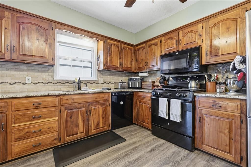 11714 W 61st Terrace — photo 13