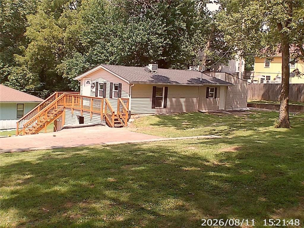 11406 E 10th Street S — photo 1