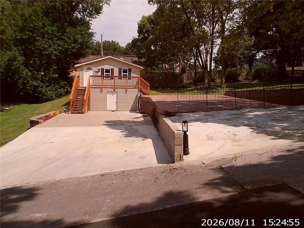 11406 E 10th Street S — photo 2