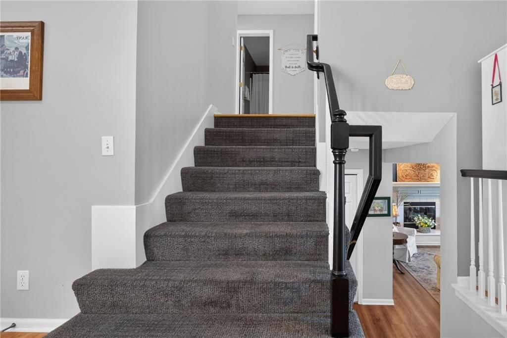 Staircase and wood stair railing at 16222 W 157th Terrace, Olathe, KS 66062