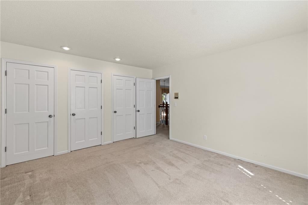 Big backyard, fenced yard and mature trees at 4965 Somerset Drive, Prairie Village, KS 66207
