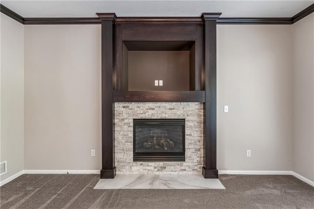 Fireplace and tile fireplace at 12178 S PRAIRIE CREEK Parkway, Olathe, KS 66062