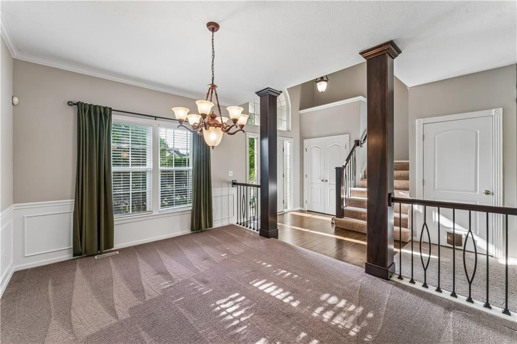 Statement lighting and wainscoting or board and batten at 12178 S PRAIRIE CREEK Parkway, Olathe, KS 66062