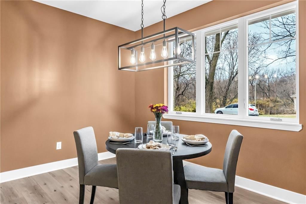 Statement lighting, tray ceiling and breakfast nook at 920 N 14th Street, Leavenworth, KS 66048