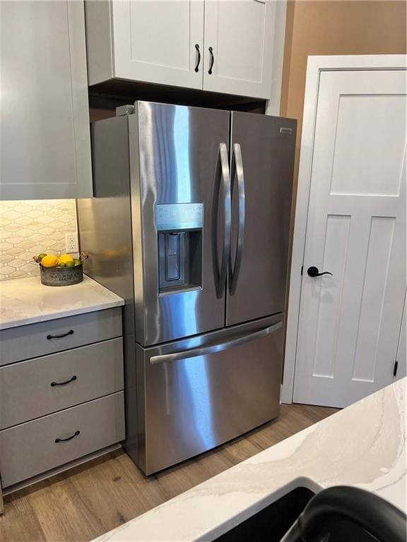 White kitchen, updated kitchen and quartz counters at 920 N 14th Street, Leavenworth, KS 66048
