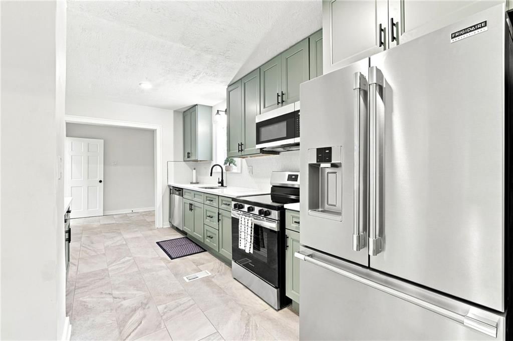 201 W 81st Terrace — photo 21
